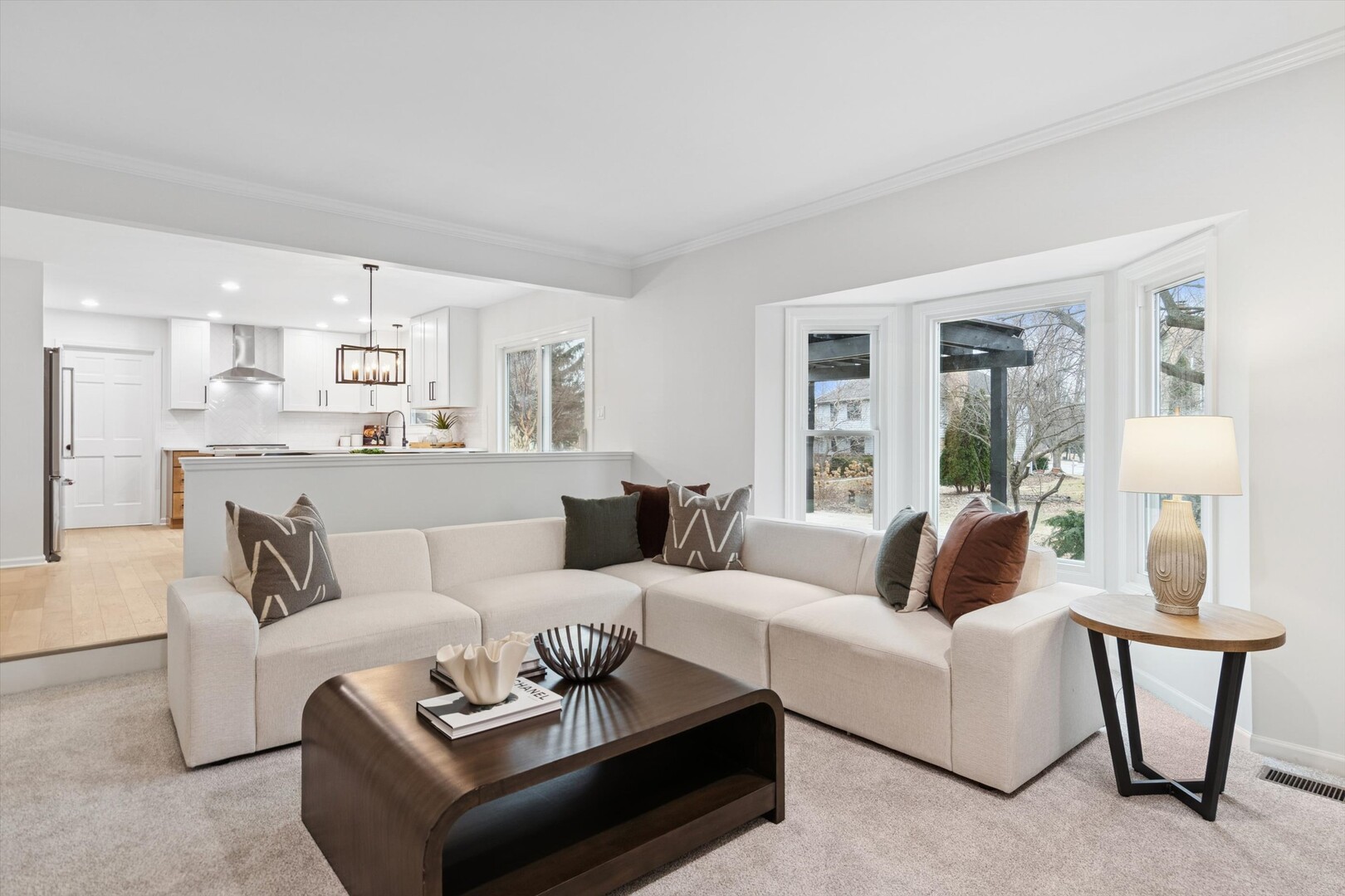 731 South River Road Naperville, IL 60540 - Photo 8 of 27 a living room with furniture and a large window