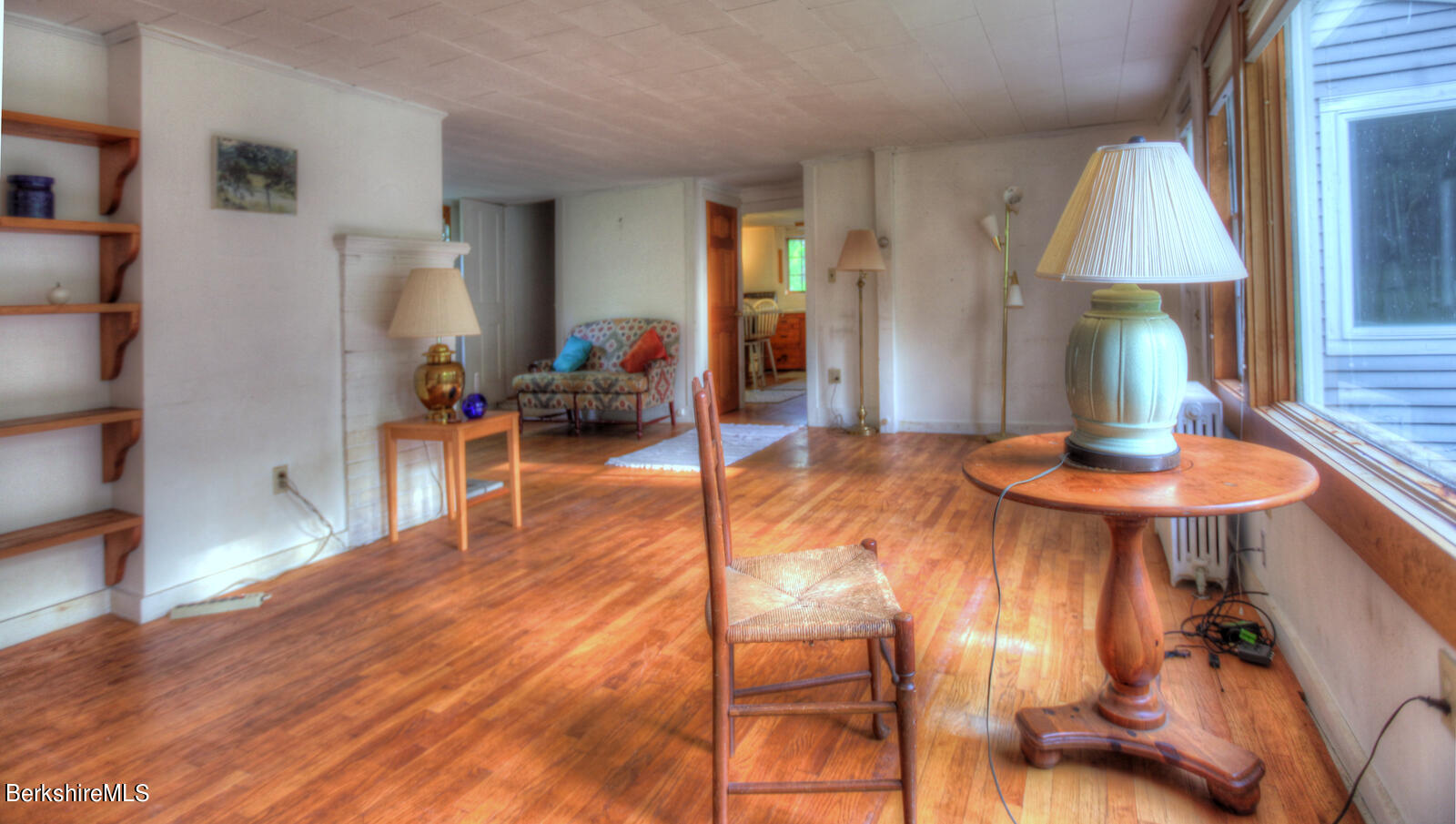 5 South Beech Plain Road Sandisfield, MA 01255 - Photo 13 of 36 a living room with furniture and a table