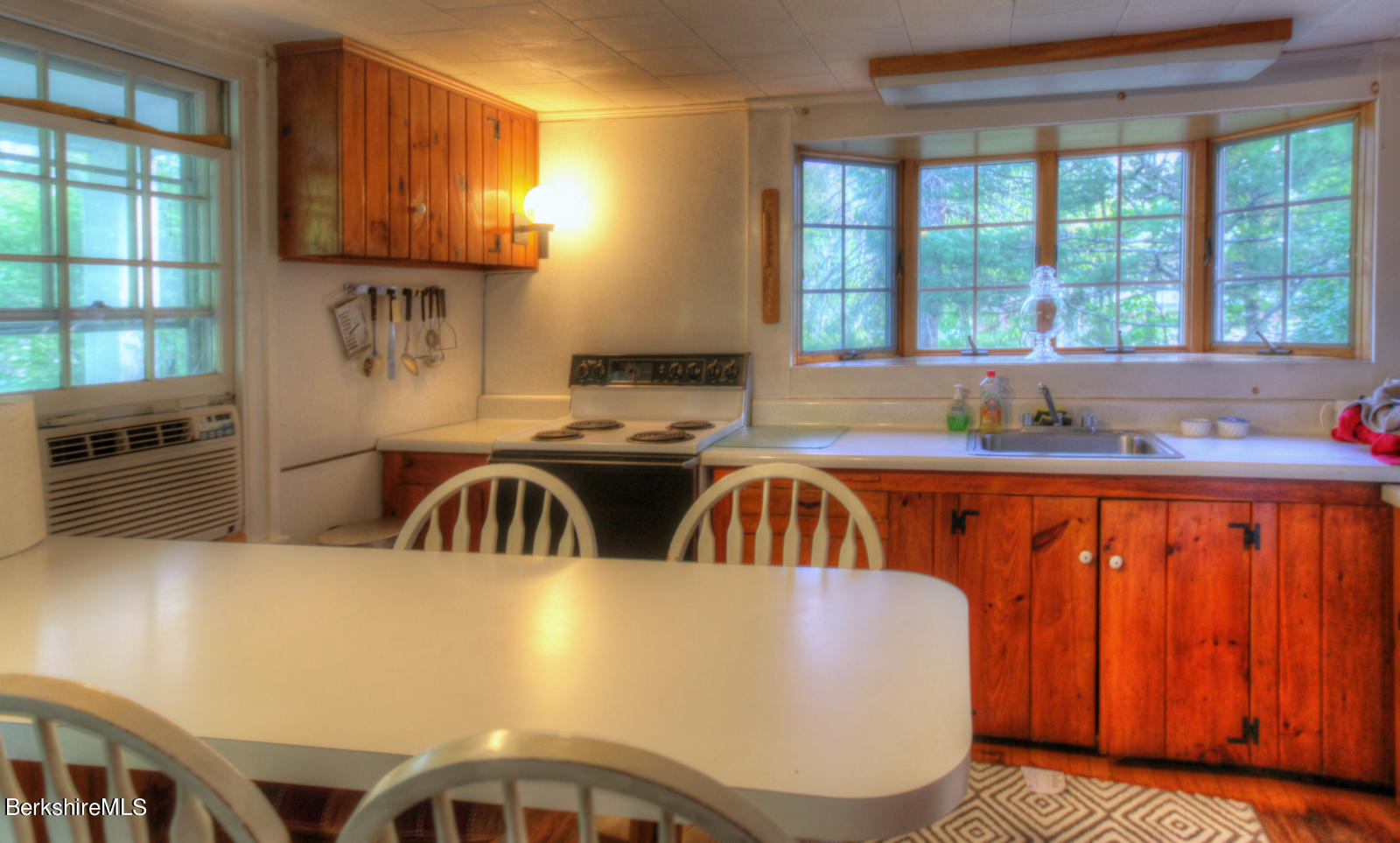 5 South Beech Plain Road Sandisfield, MA 01255 - Photo 16 of 36 a kitchen with a sink a stove and a microwave