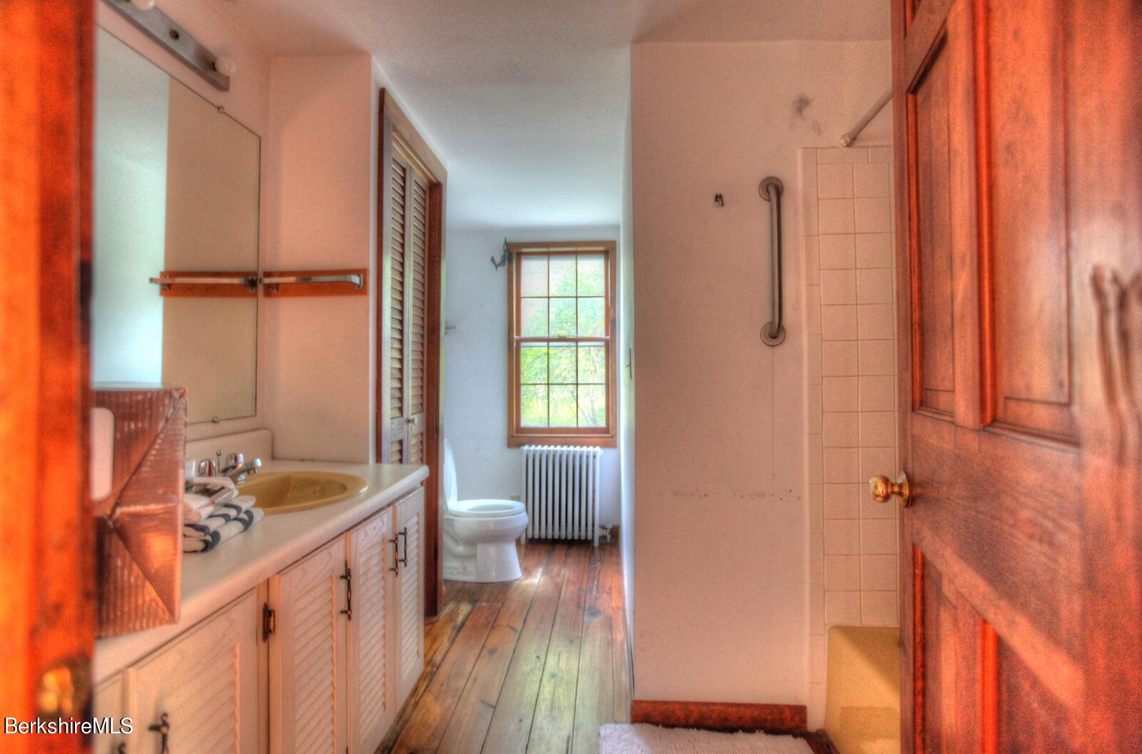 5 South Beech Plain Road Sandisfield, MA 01255 - Photo 23 of 36 a bathroom with a sink a toilet and shower