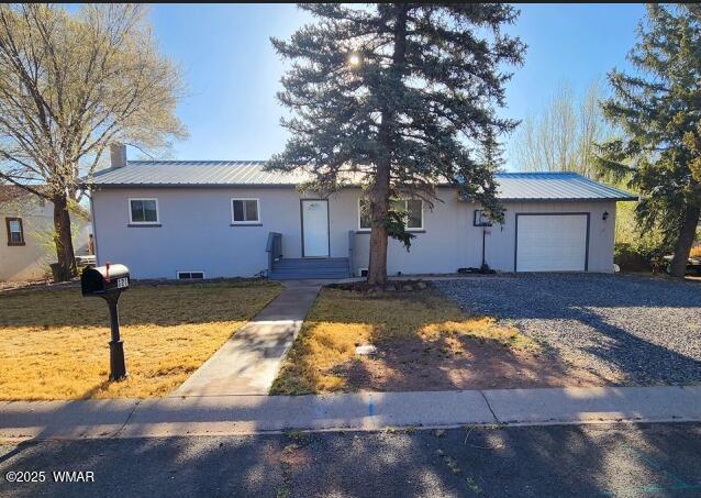 121 Harmony Lane Springerville, AZ 85938 - Photo 1 of 28 a view of a house with yard covered in snow