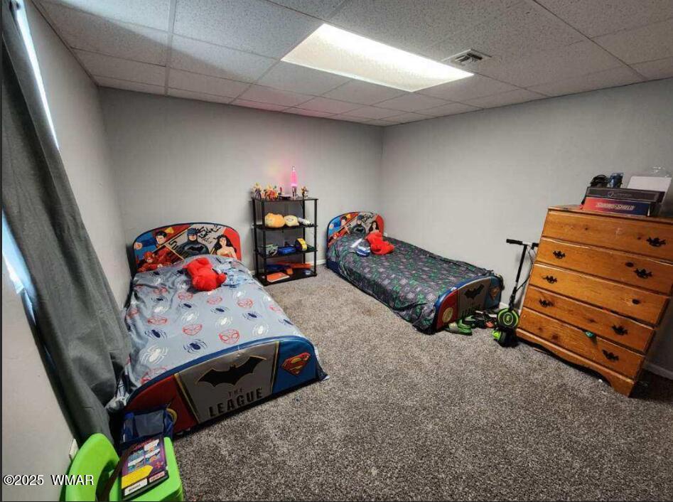 121 Harmony Lane Springerville, AZ 85938 - Photo 23 of 28 a kids room with toys and dresser