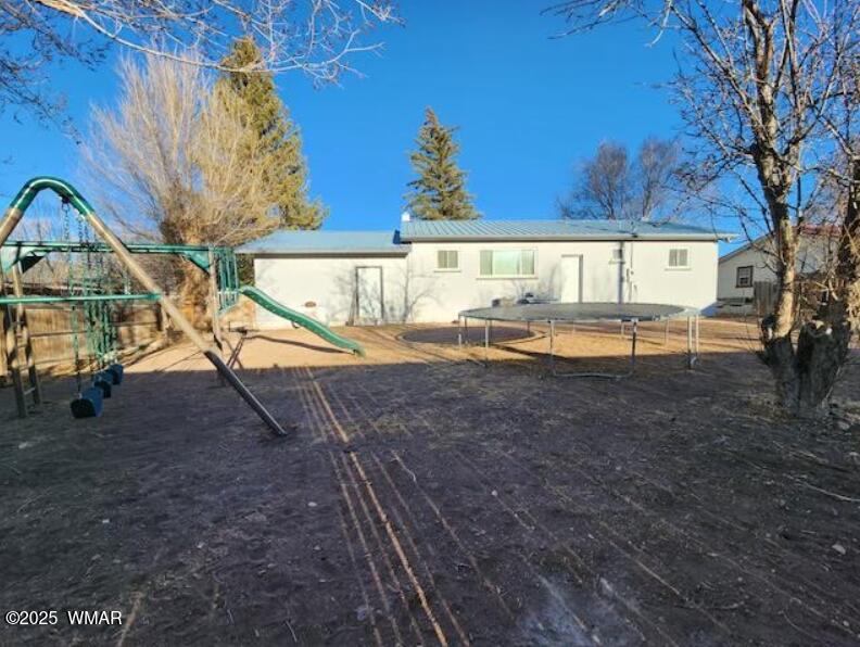 121 Harmony Lane Springerville, AZ 85938 - Photo 27 of 28 a view of swimming pool with a yard