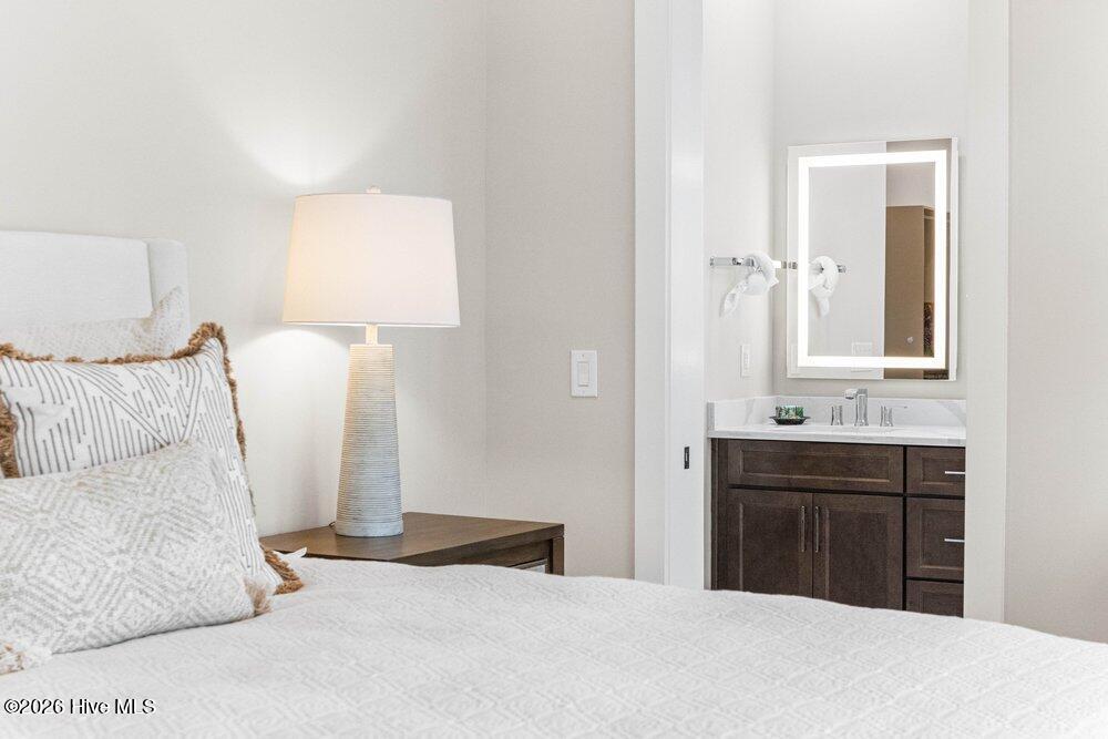 357 Planters Walk Hampstead, NC 28443 - Photo 27 of 62 The Primary Suite has a peaceful feeling.