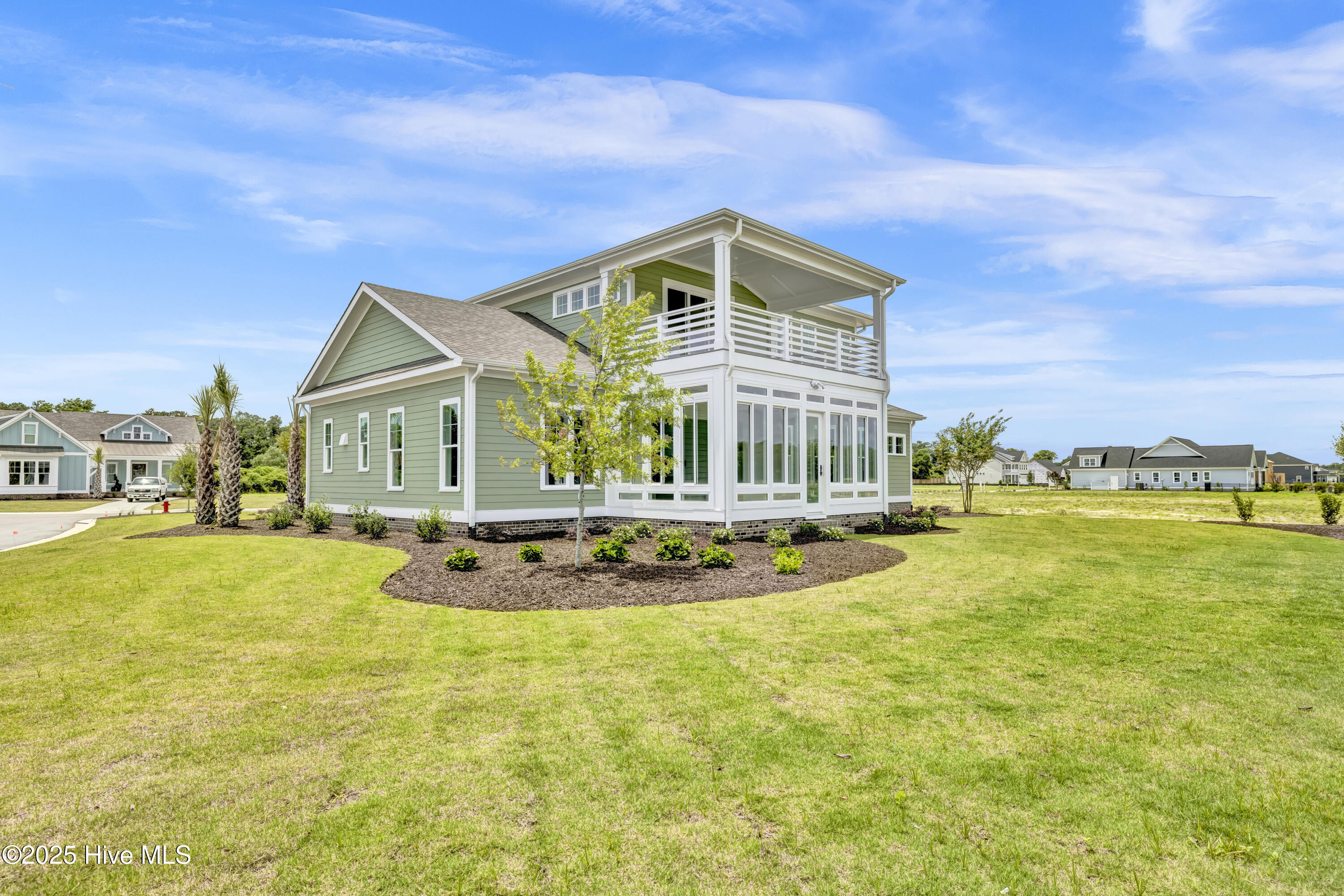 357 Planters Walk Hampstead, NC 28443 - Photo 58 of 62 Look at the custom details and glass in the sunroom.