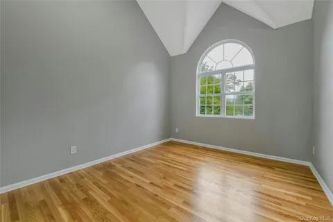 an empty room that has a window