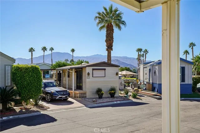 a view of a street with cars