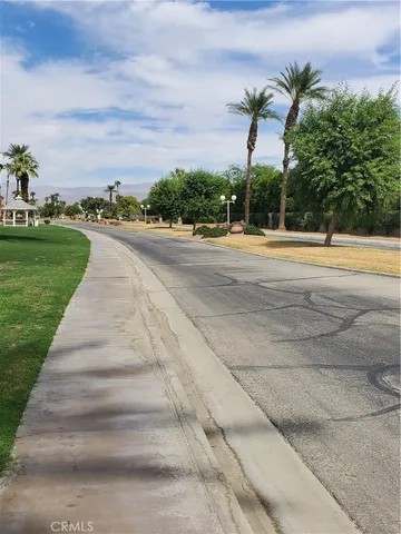 a view of a back yard of the house