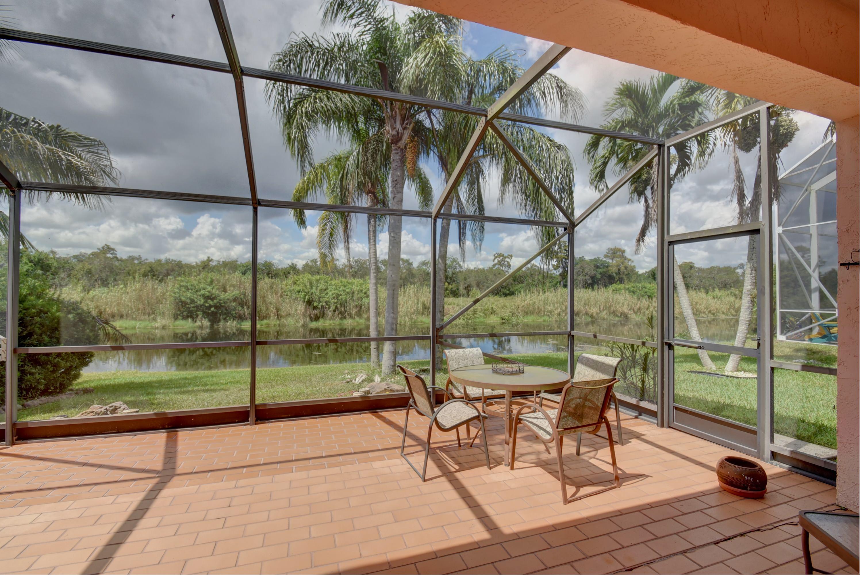 18102 Clear Brook Circle Boca Raton, FL 33498 - Photo 29 of 34 Patio with Lake View