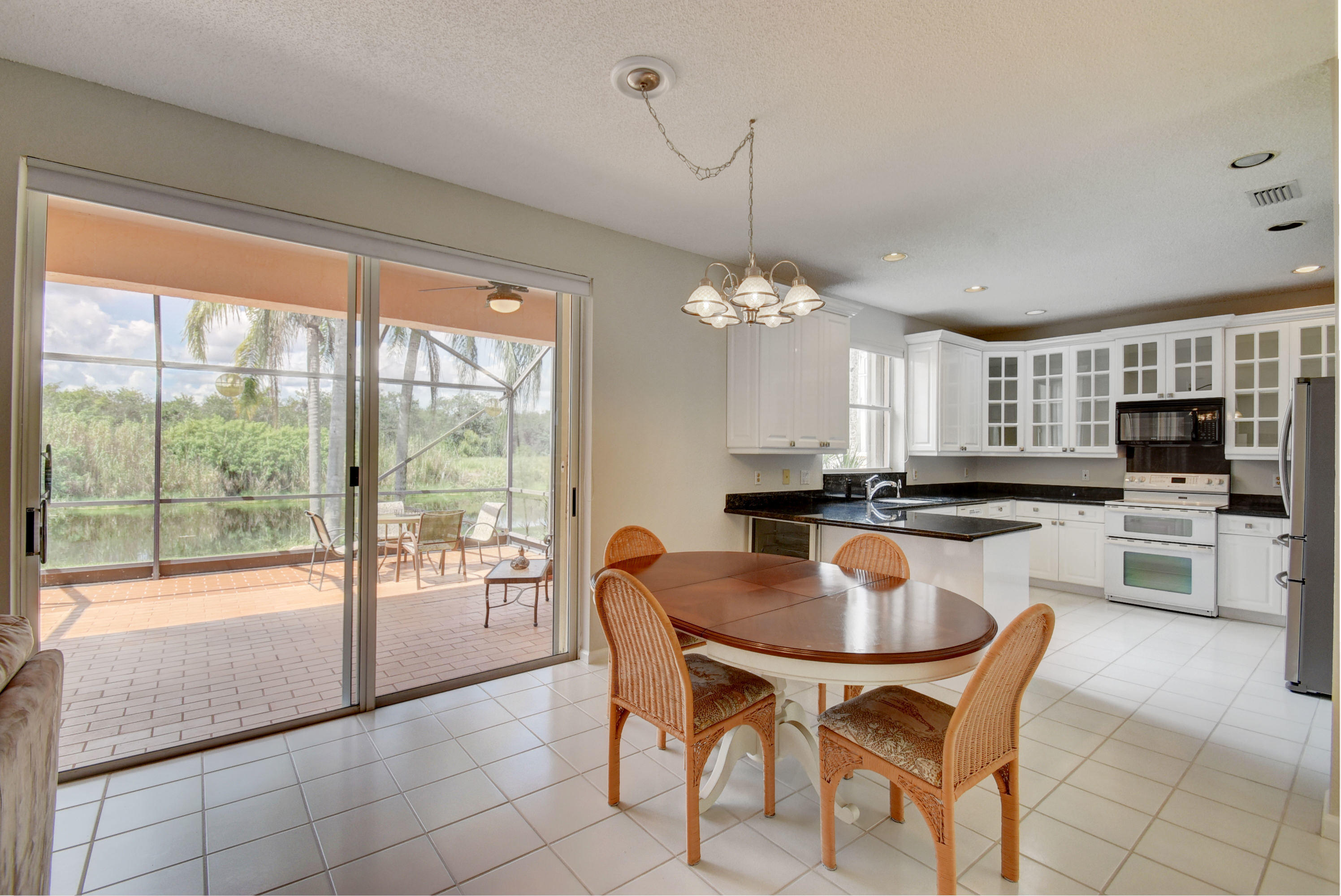 18102 Clear Brook Circle Boca Raton, FL 33498 - Photo 10 of 34 Breakfast Area overlooks the patio