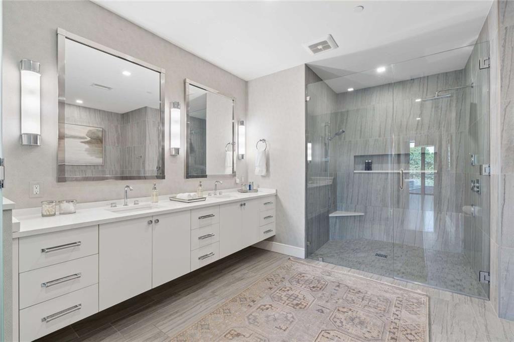 2520 Peachtree Road, Unit 603 Atlanta, GA 30305 - Photo 39 of 91 a bathroom with a double vanity sink mirror and double