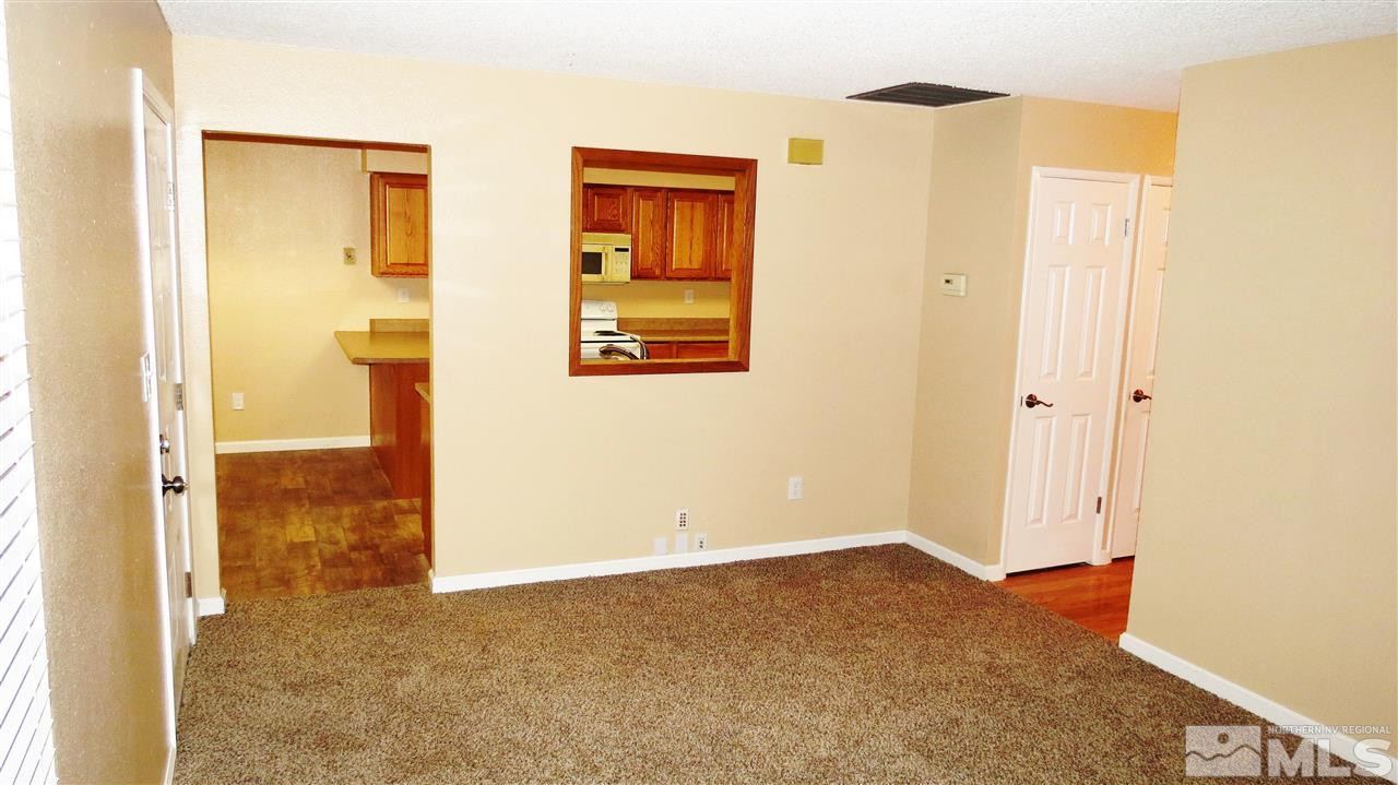 6525 Lotus Street Reno, NV 89506 - Photo 12 of 25 a view of a bathroom from a hallway