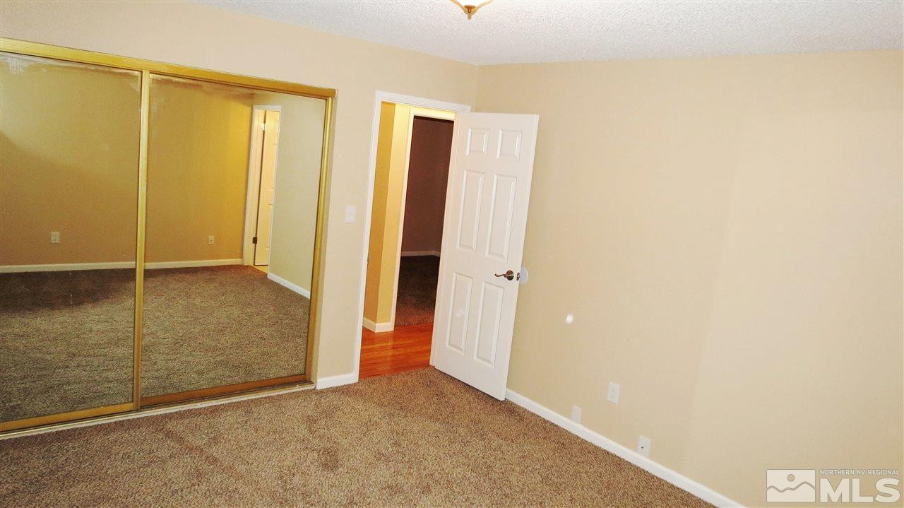6525 Lotus Street Reno, NV 89506 - Photo 18 of 25 an empty room with sliding door