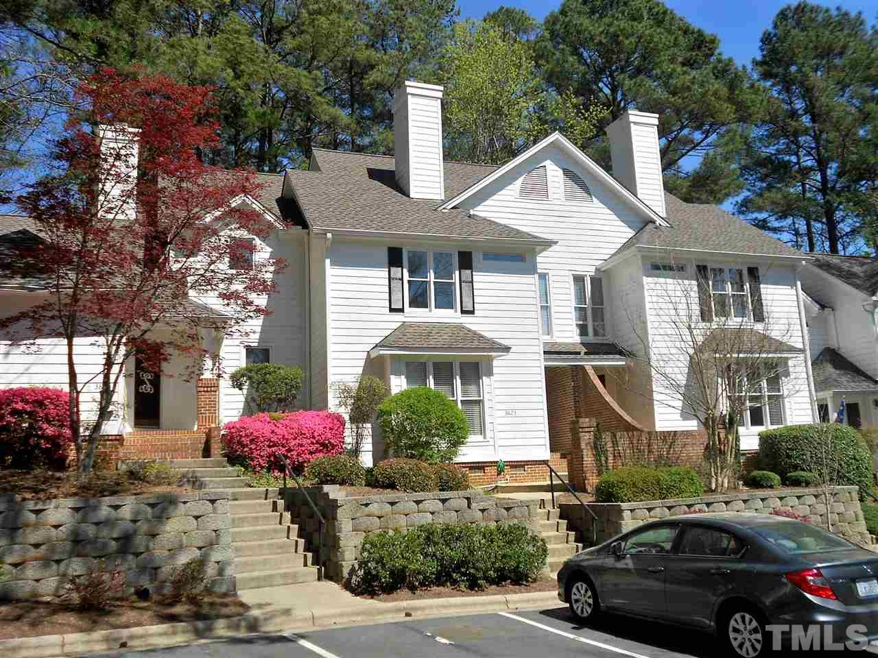 3823 Carnegie Lane Raleigh, NC 27612 - Photo 1 of 25 a front view of a house with a yard