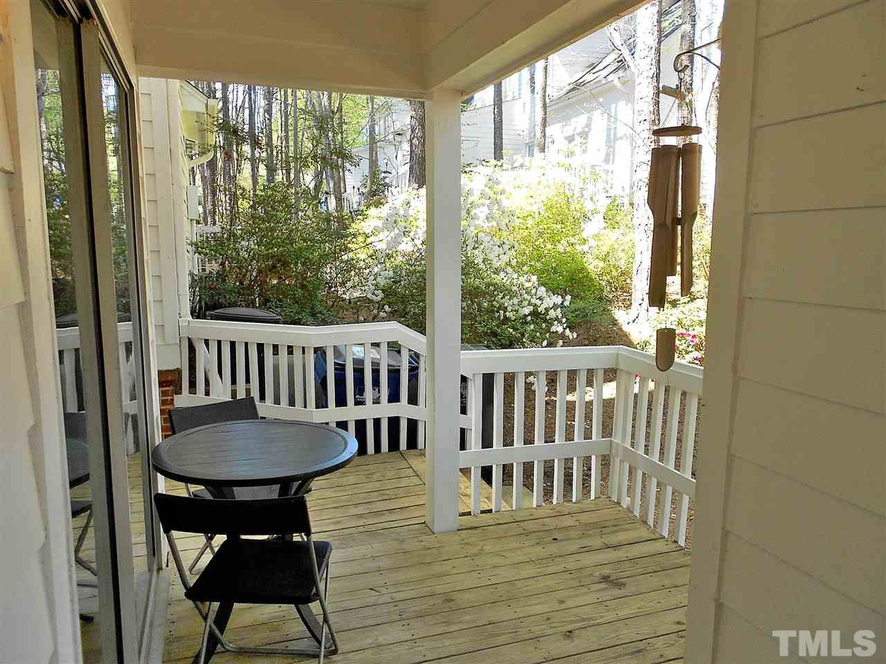 3823 Carnegie Lane Raleigh, NC 27612 - Photo 9 of 25 a view of a two chairs and table in the balcony