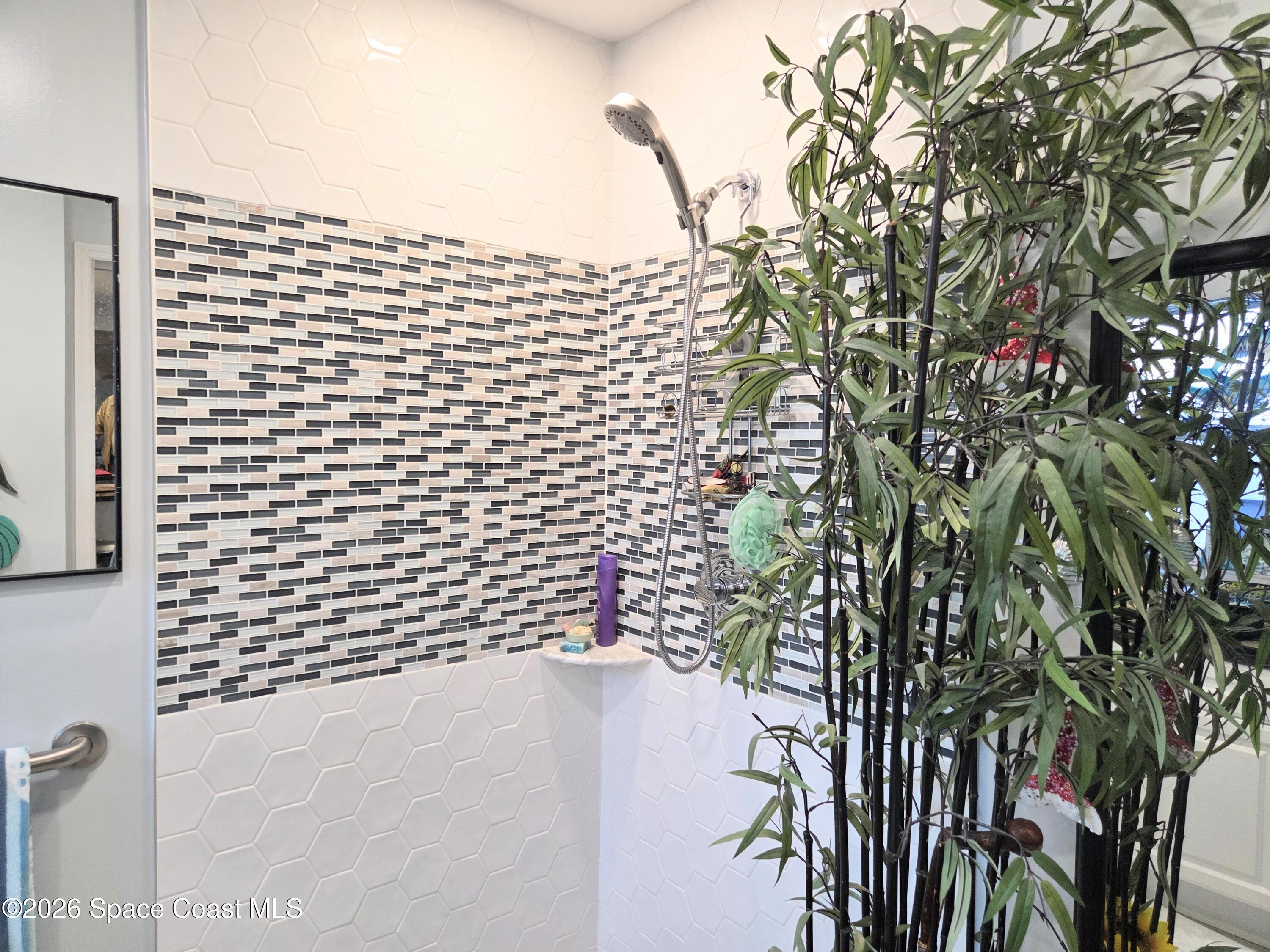 416 North 4th Street Cocoa Beach, FL 32931 - Photo 15 of 22 a bathroom with a shower