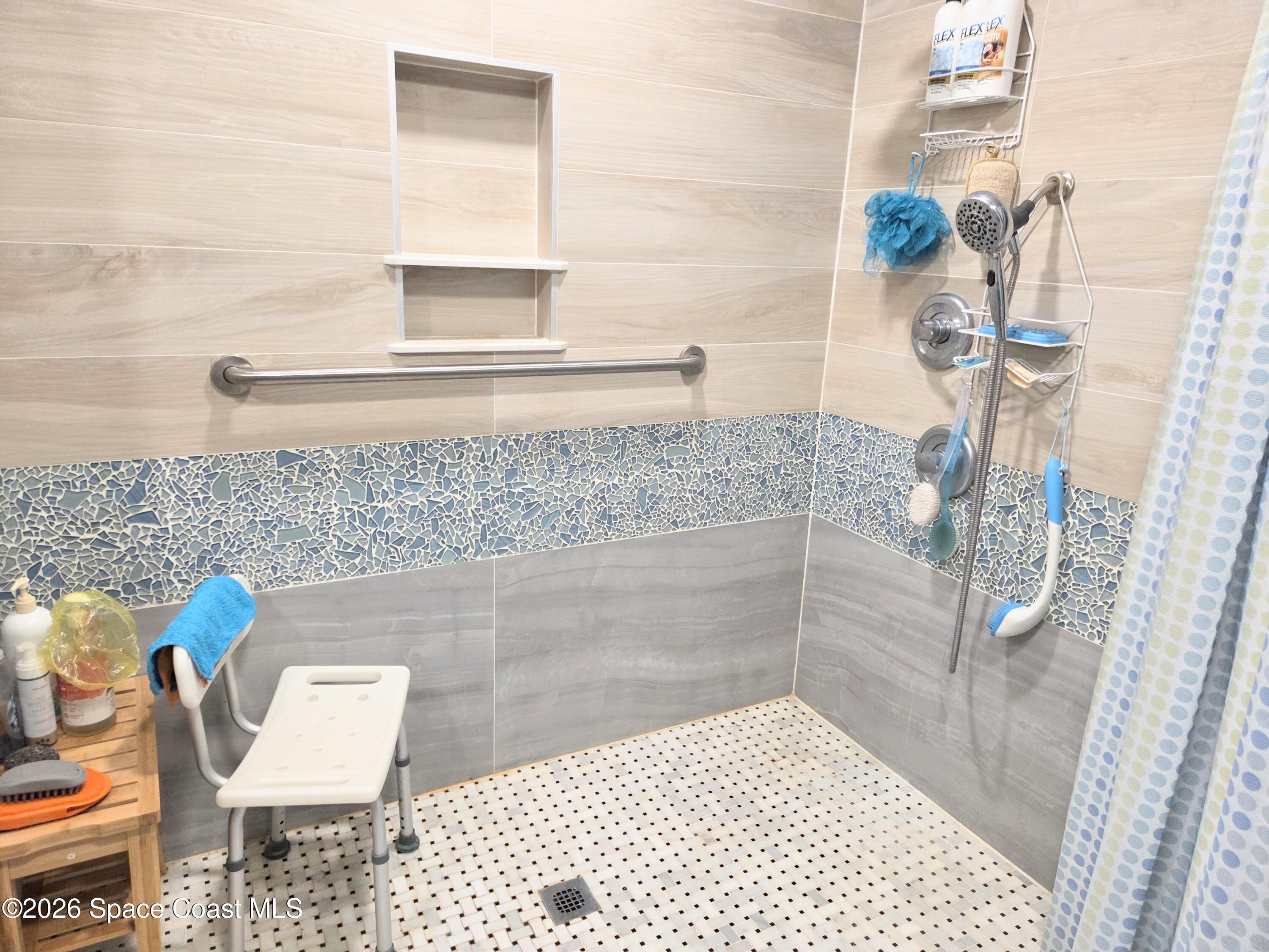 416 North 4th Street Cocoa Beach, FL 32931 - Photo 16 of 22 a bathroom with a sink a toilet and shower