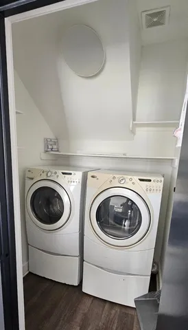 a utility room with dryer and washer