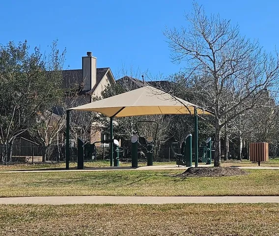 a view of a park with of trees