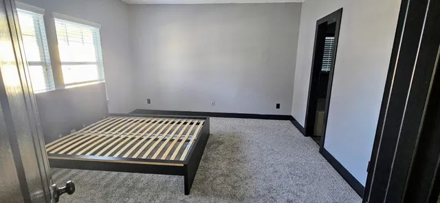 an empty room with windows