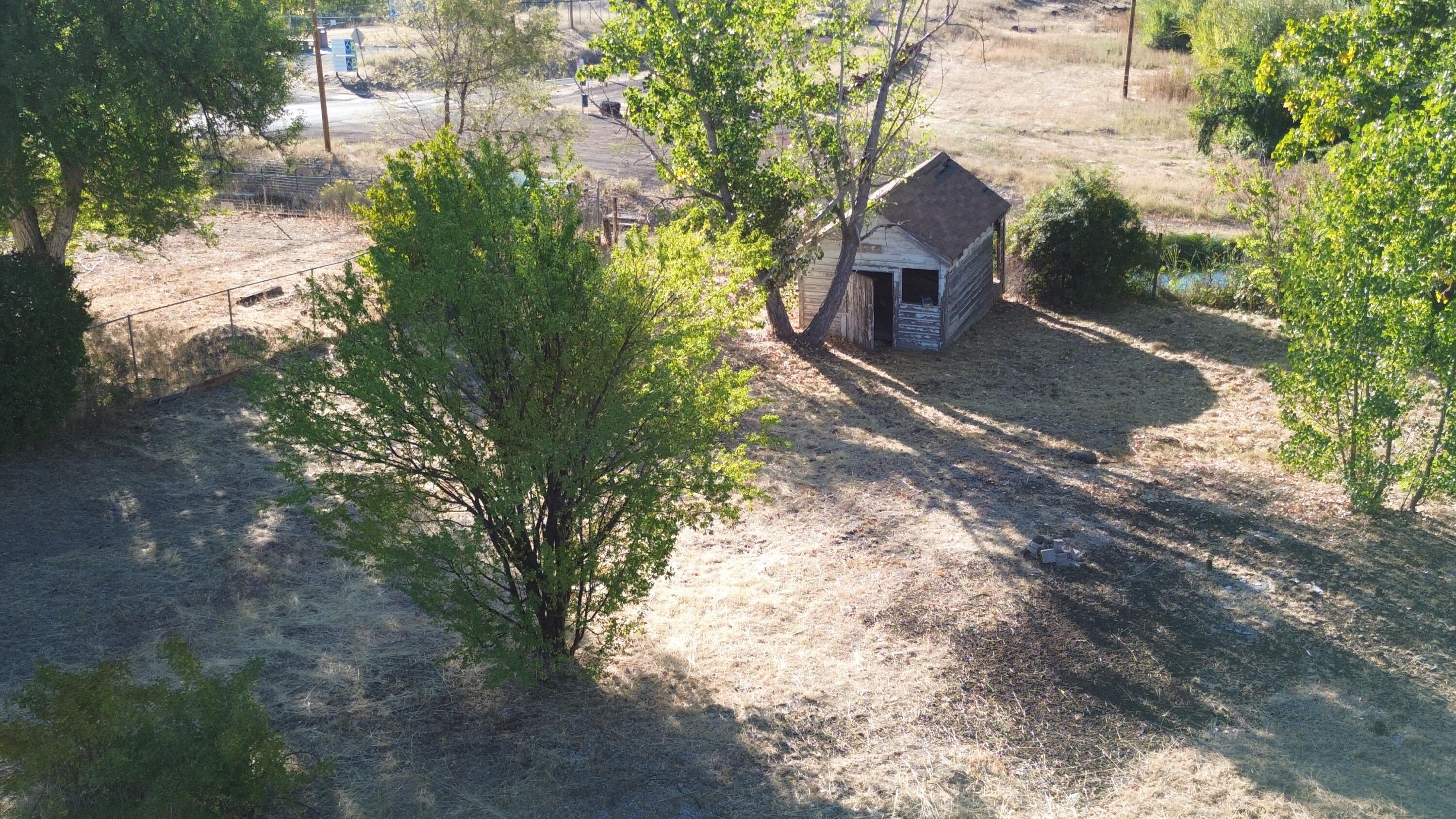 43195 Bridge Street Fall River Mills, CA 96028 - Photo 8 of 20 a front view of a house with a yard