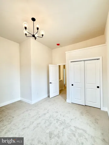 a bathroom with a sink a toilet and bathtub