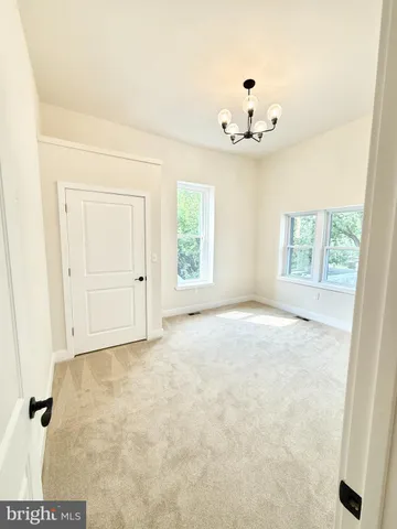 a view of street with parked cars