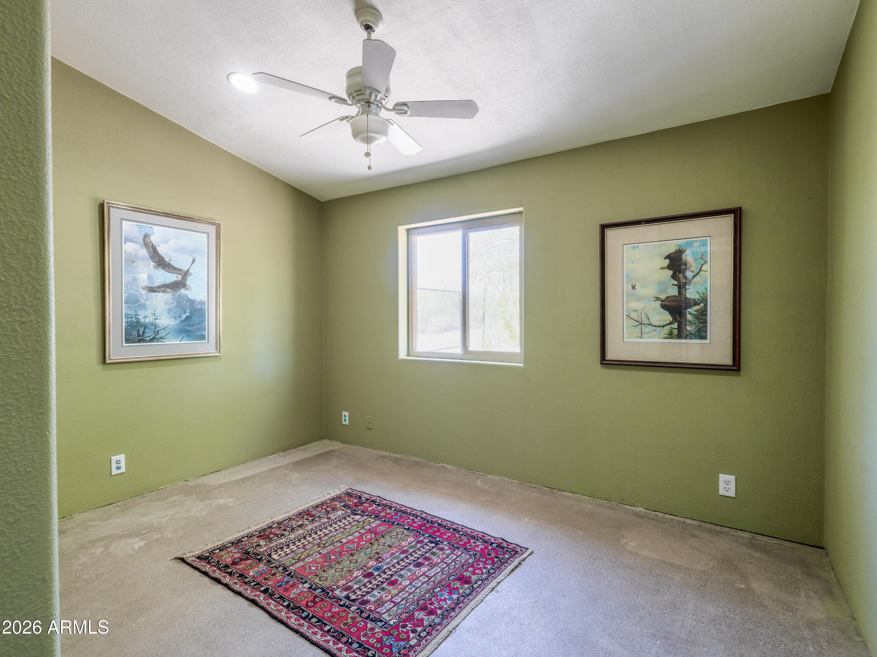 1224 North Acacia Road Apache Junction, AZ 85119 - Photo 36 of 48 a view of room with window and ceiling fan