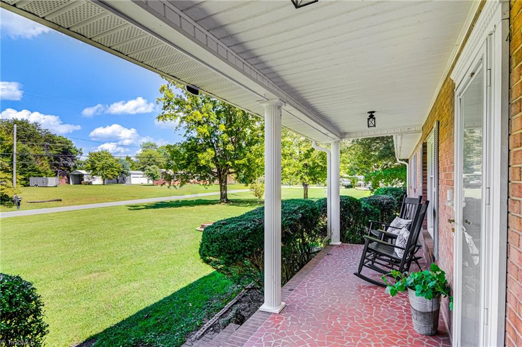 2606 Maxine Drive High Point, NC 27265 - Photo 3 of 34 Wonderful covered porch welcomes you to home!