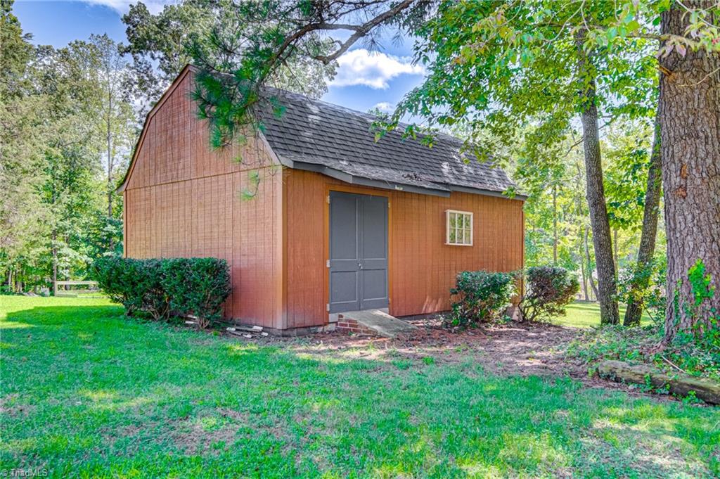 2606 Maxine Drive High Point, NC 27265 - Photo 30 of 34 Backyard also has a large barn storage building!