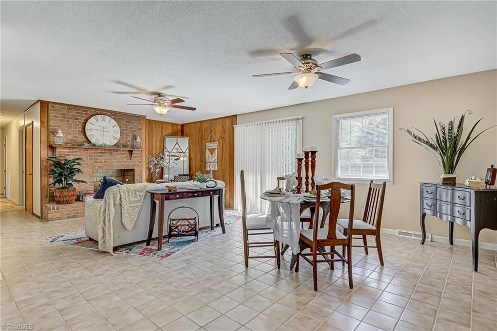 2606 Maxine Drive High Point, NC 27265 - Photo 34 of 34 After passing through foyer, beautiful open floorplan between den, dining area, and kitchen will greet you.