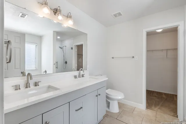 a bathroom with a bath tub and a shower