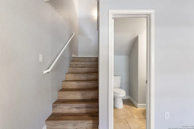 a view of empty room with windows