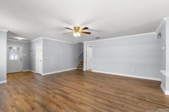 a view of kitchen with wooden floor and window