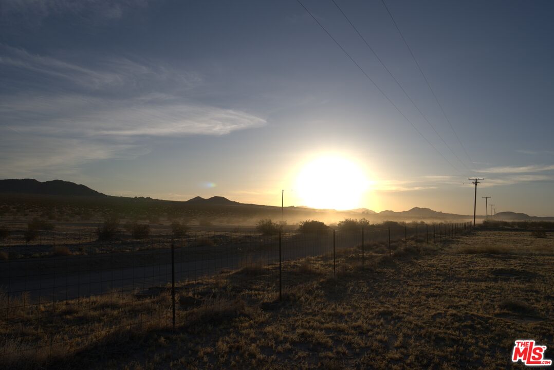 10424 Santa Fe Fire Road Lucerne Valley, CA 92356 - Photo 23 of 33 a view of a mountain with a forest