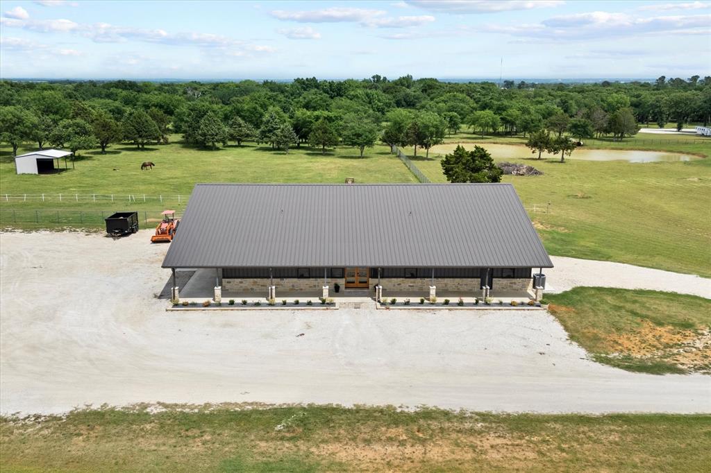 10701 Osburn Road Pilot Point, TX 76258 - Photo 6 of 37 Front view of the barn looking east