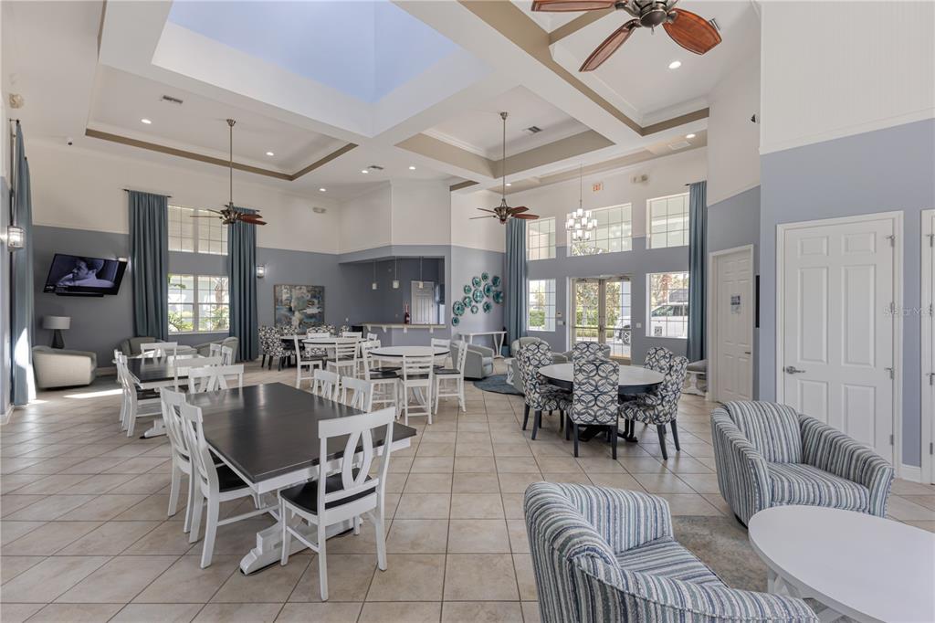 506 Rainbow Springs Loop Groveland, FL 34736 - Photo 26 of 30 a view of a dining room with furniture window and outside view
