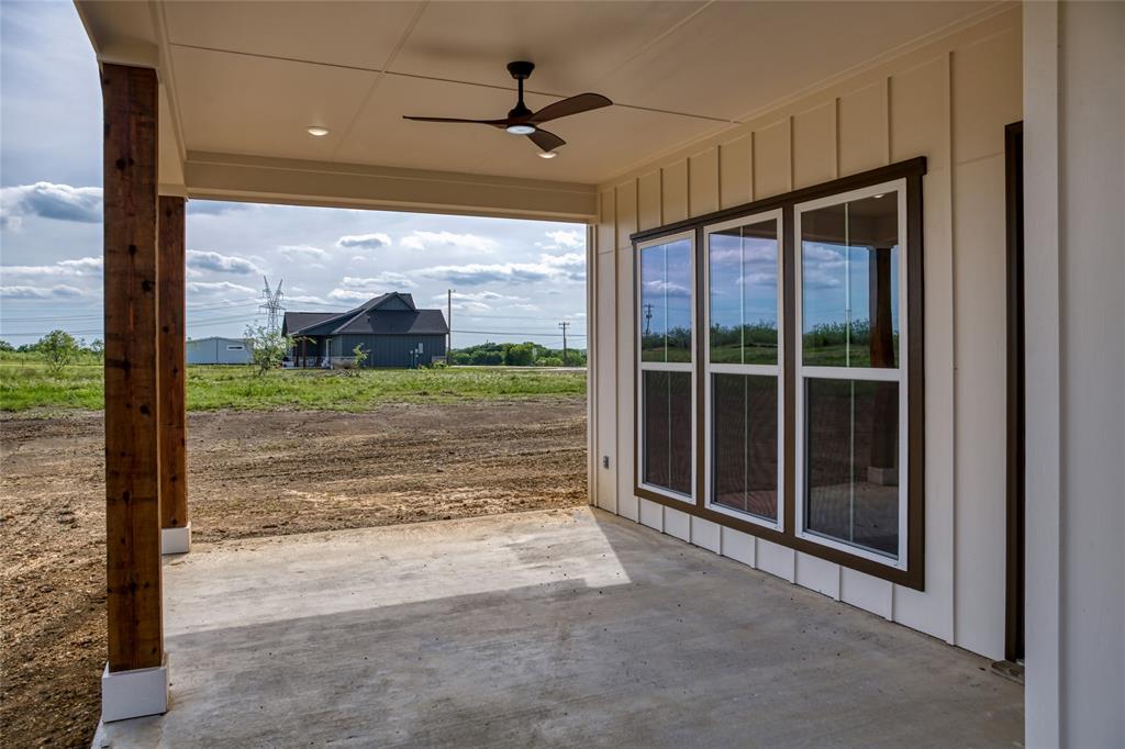 217 Fm 2258 Venus, TX 76084 - Photo 11 of 36 a view of a porch with a floor to ceiling window