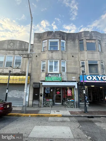 a front view of a building with glass windows