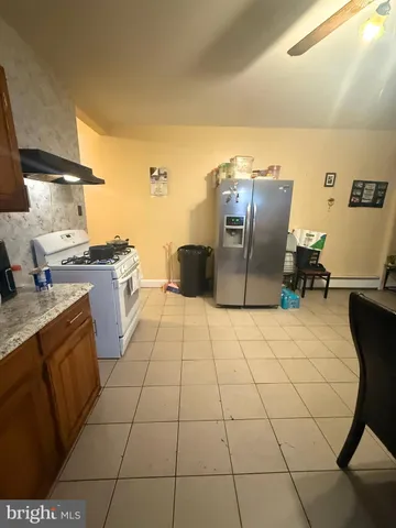 a kitchen with a sink cabinets and appliances