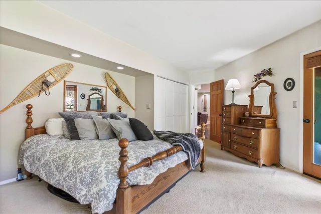 a living room with furniture and a ceiling fan