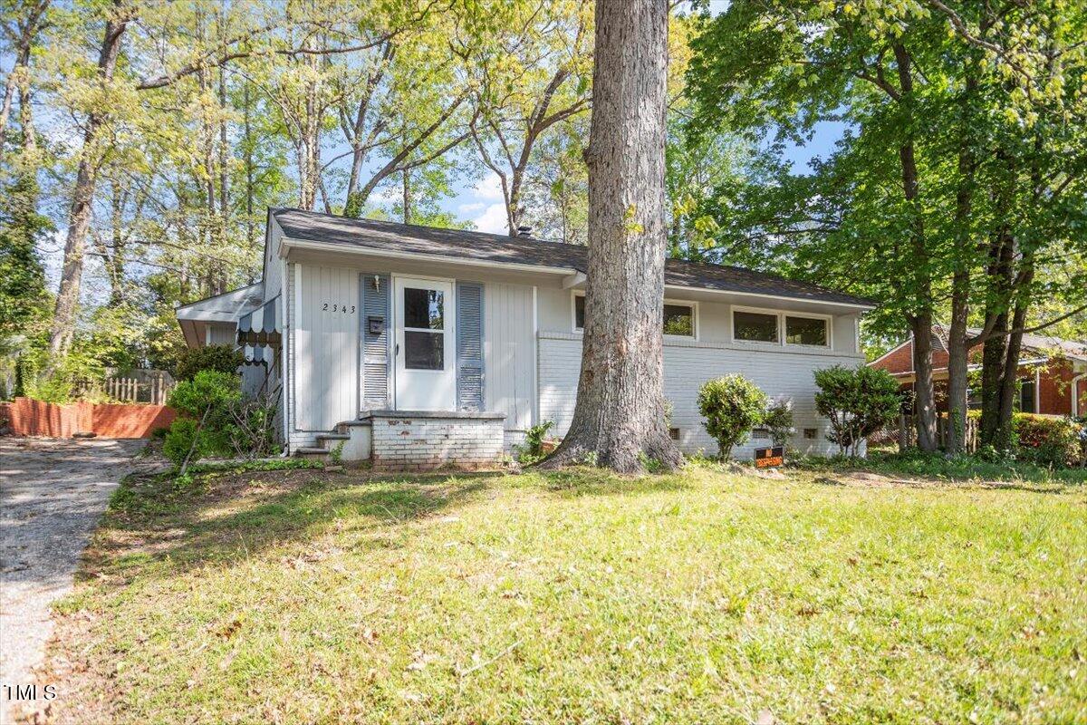2343 Derby Drive Raleigh, NC 27610 - Photo 27 of 28 a view of a house with a yard