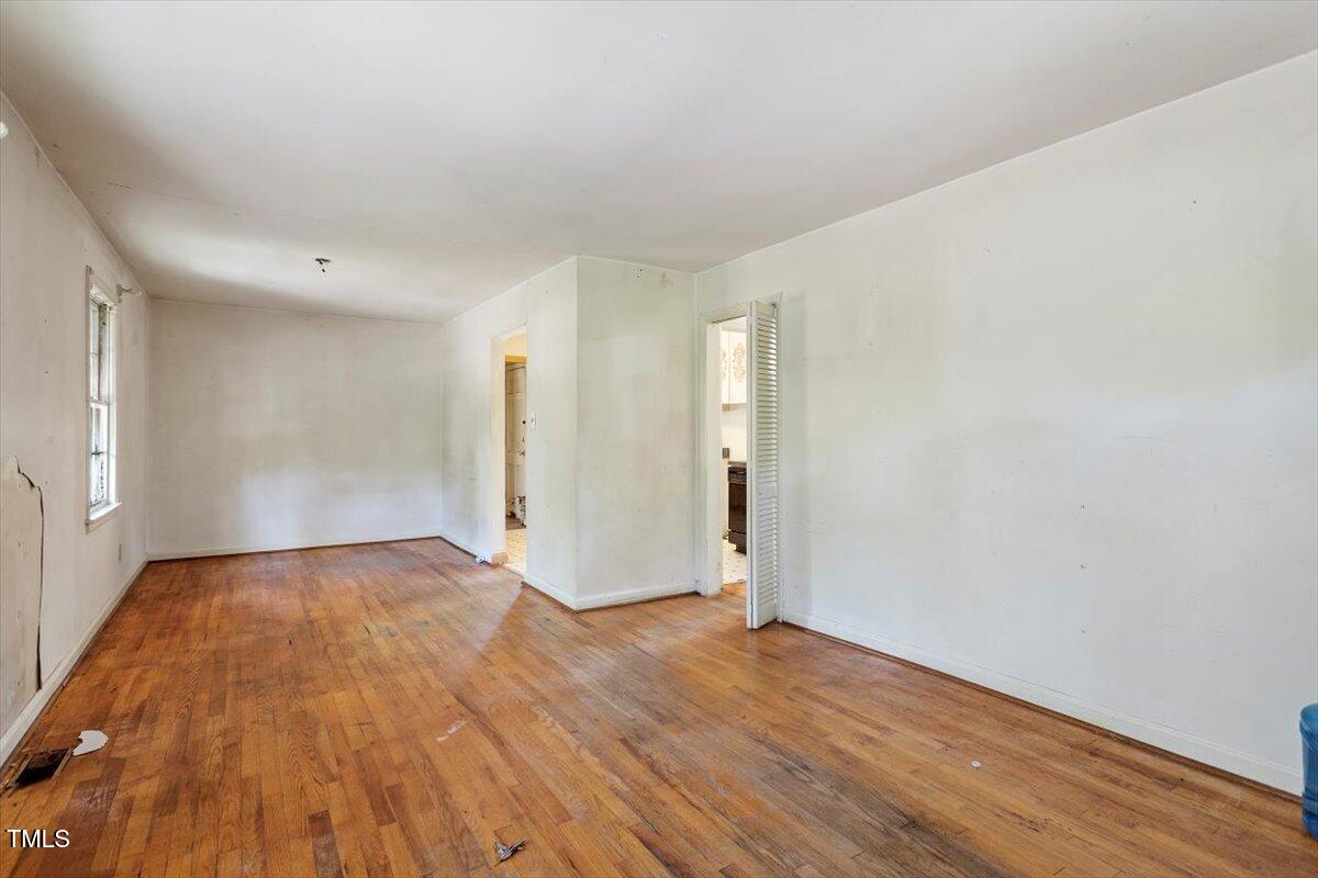 2343 Derby Drive Raleigh, NC 27610 - Photo 3 of 28 a view of an empty room and wooden floor