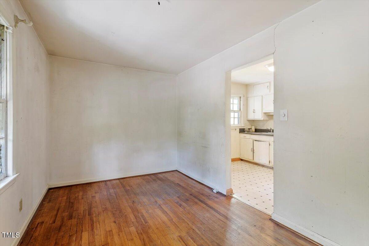 2343 Derby Drive Raleigh, NC 27610 - Photo 7 of 28 a view of empty room with wooden floor