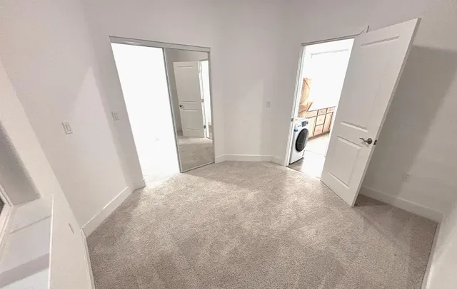 a view of livingroom and hardwood floor