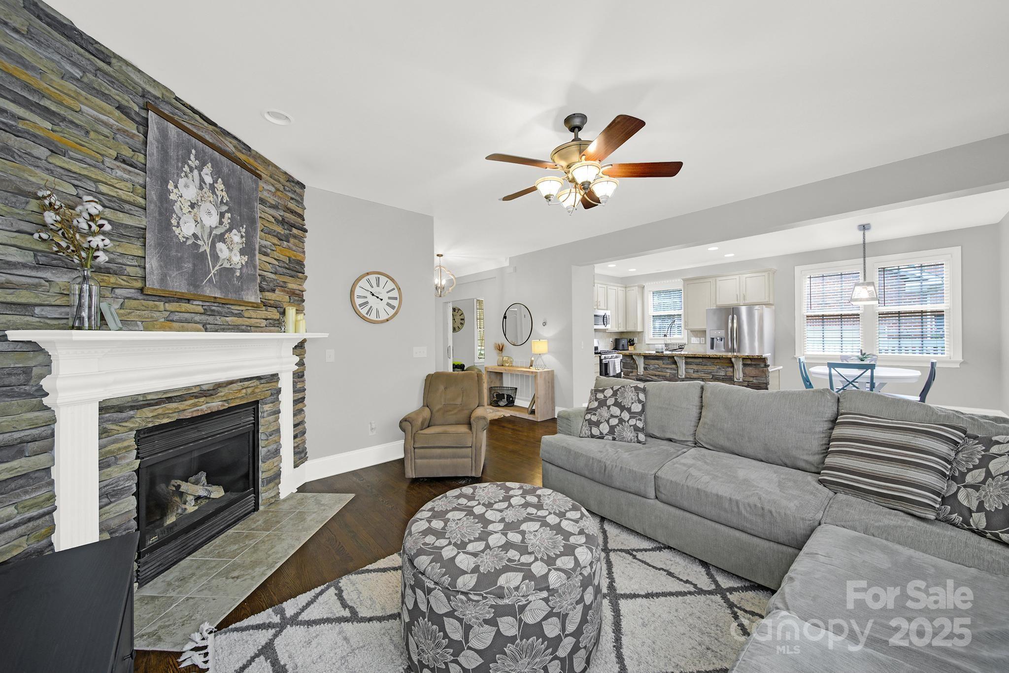 110 Sonnys Way Fort Mill, SC 29708 - Photo 14 of 48 a living room with furniture a fireplace and a window