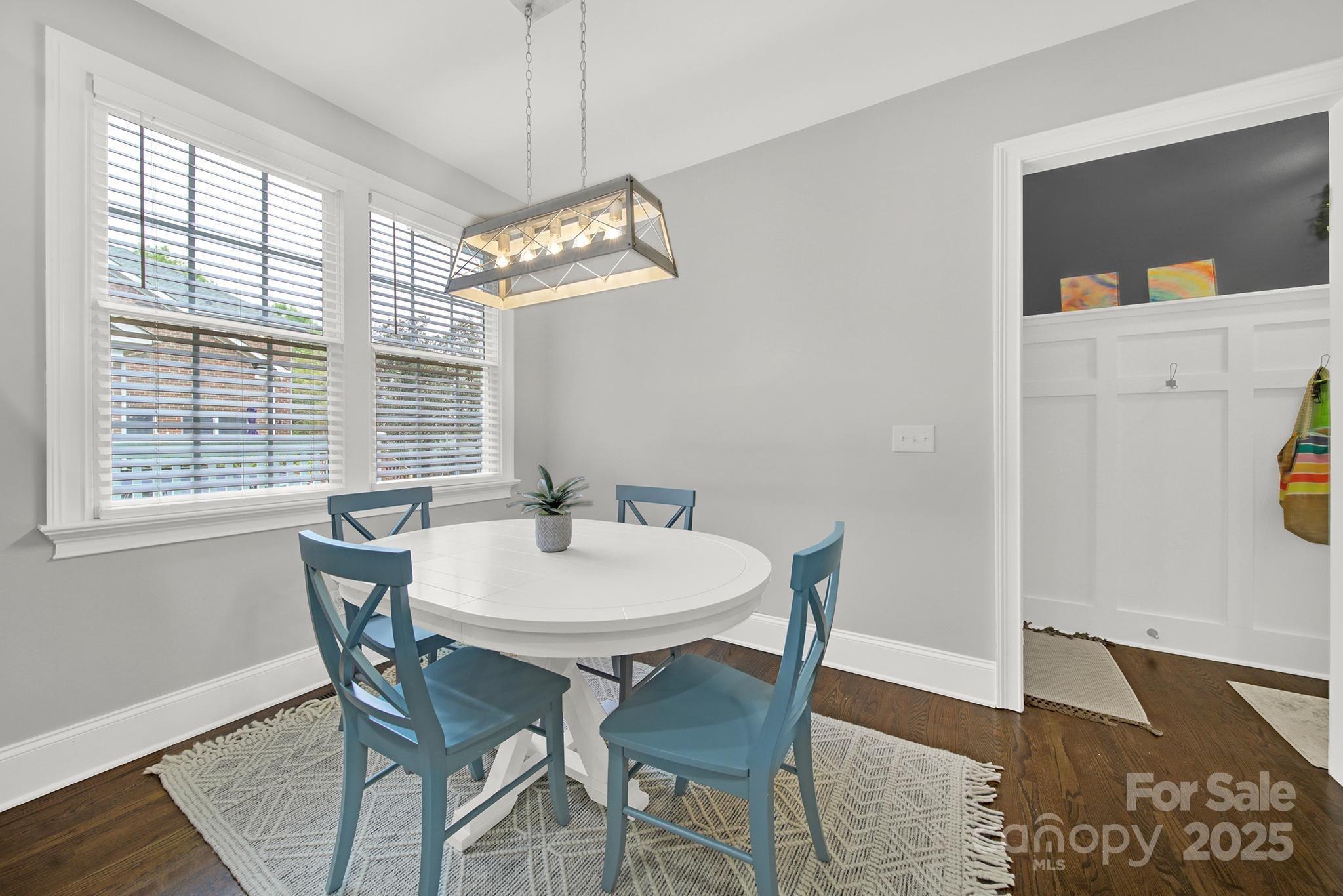 110 Sonnys Way Fort Mill, SC 29708 - Photo 19 of 48 a view of a dining room with furniture window and wooden floor