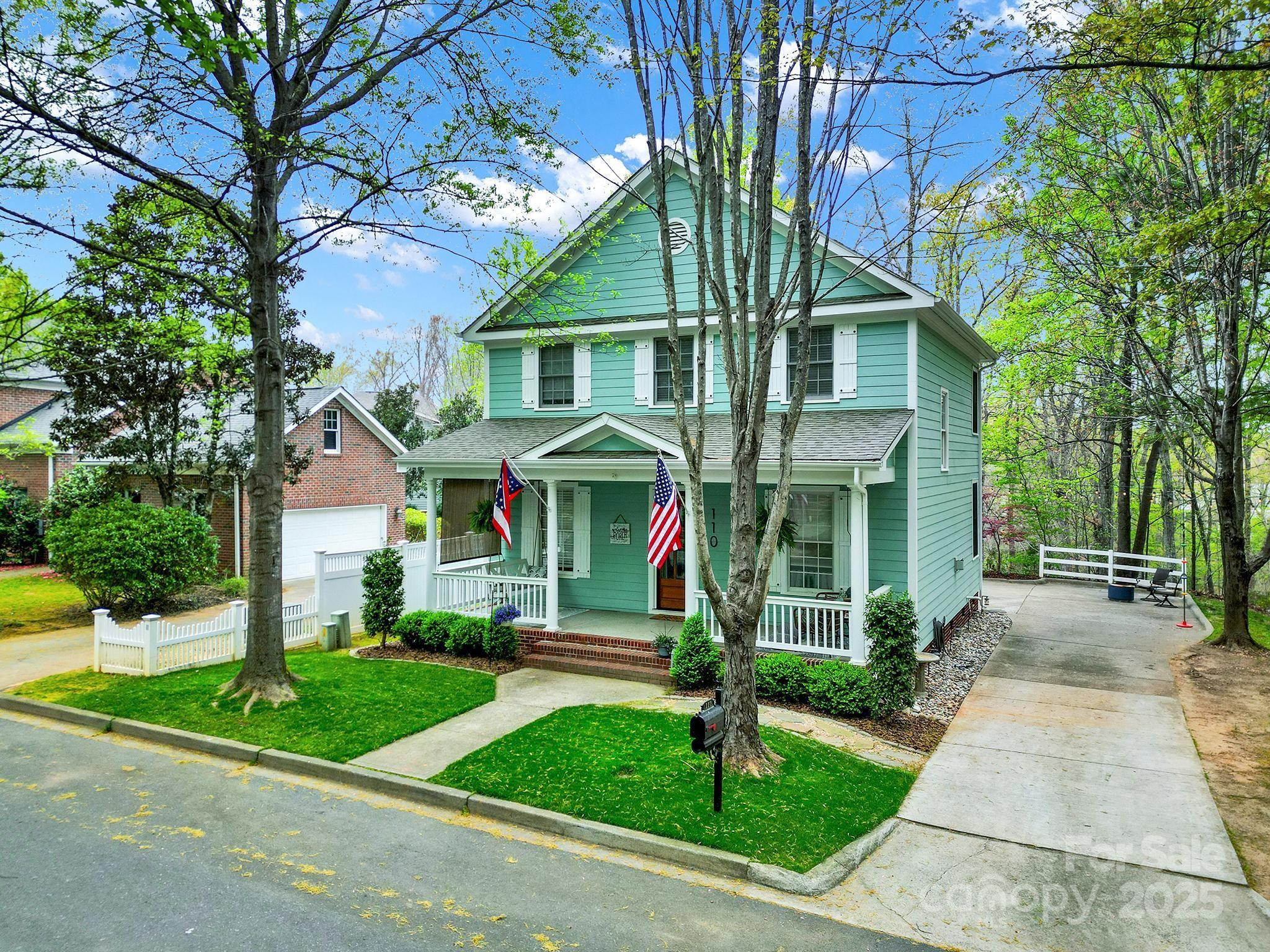 110 Sonnys Way Fort Mill, SC 29708 - Photo 2 of 48 a front view of a house with garden