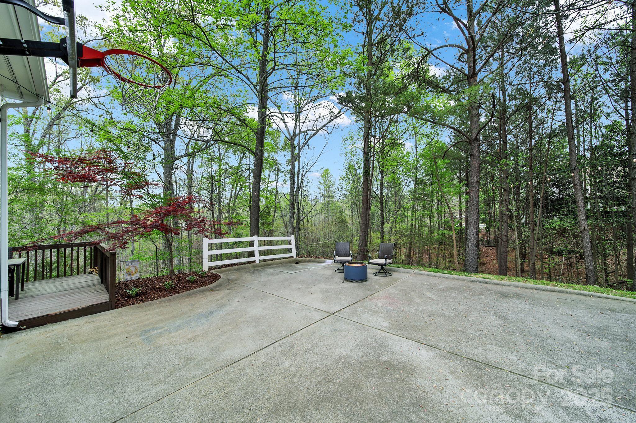 110 Sonnys Way Fort Mill, SC 29708 - Photo 38 of 48 a view of a bench in backyard of house