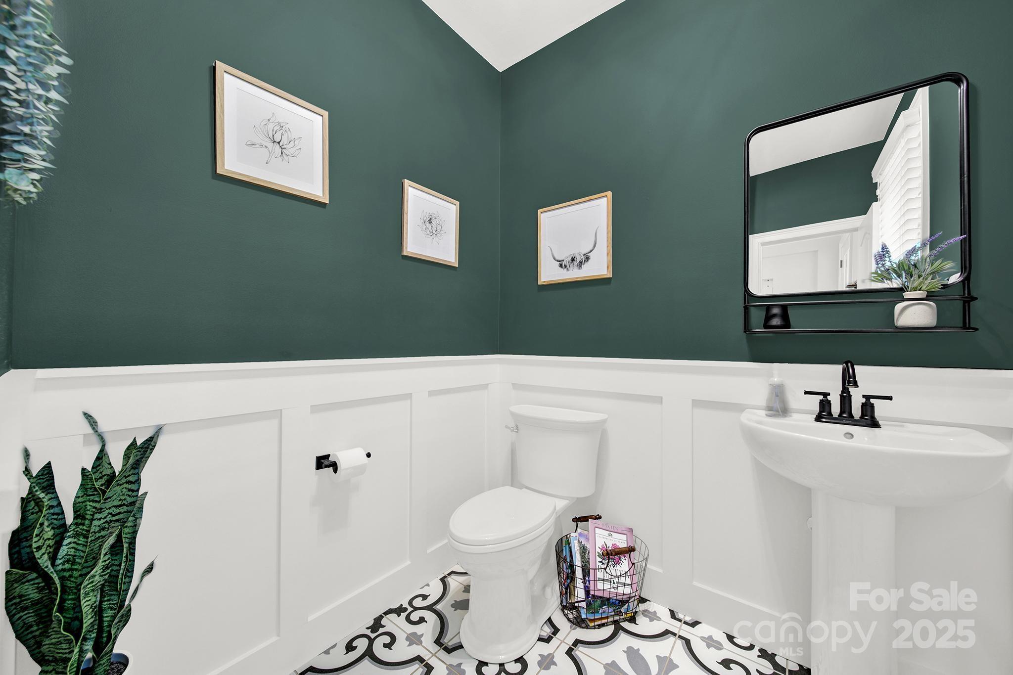 110 Sonnys Way Fort Mill, SC 29708 - Photo 9 of 48 a bathroom with a toilet sink and mirror